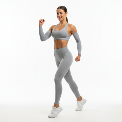 Woman wearing slimming arm shaper compression sleeves during workout